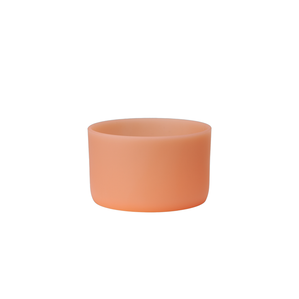 Owala Bottle Boot in translucent matte peach orange silicone, wide short cylindrical form for FreeSip Tumbler and Sway bottles