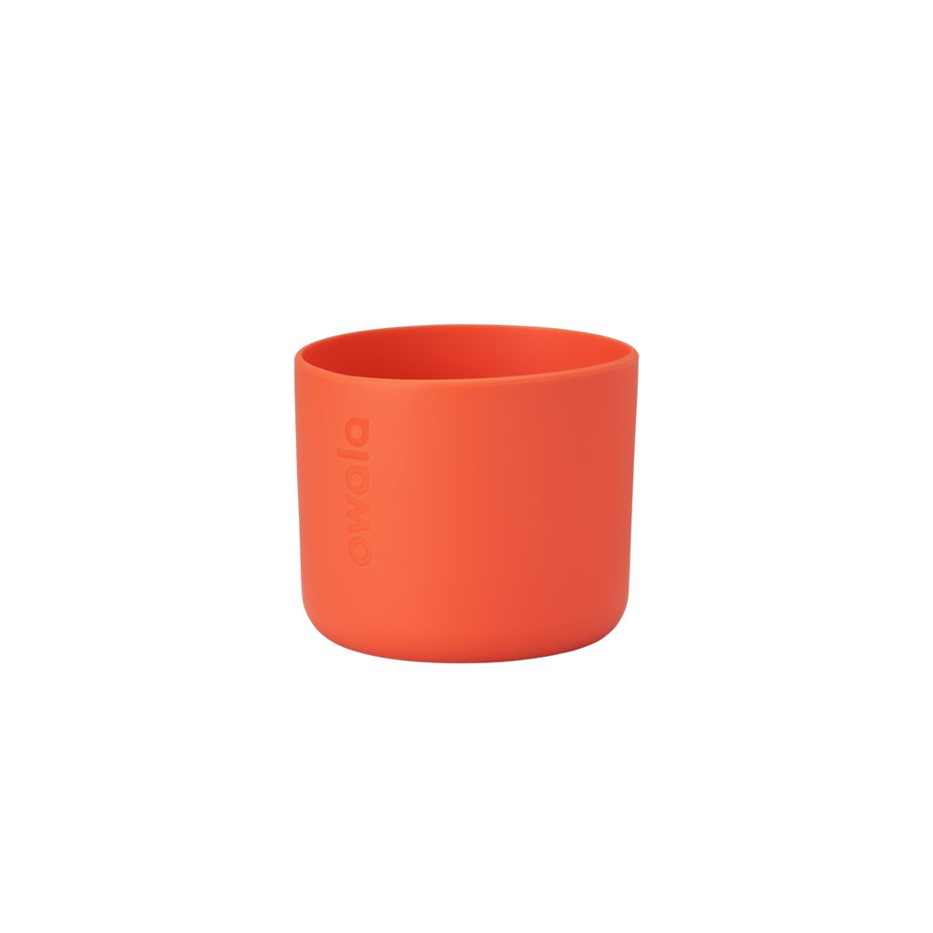 Owala Bottle Boot in bright tangerine orange silicone with tonal Owala logo, short cylindrical form sized for 16oz Kids' FreeSip bottles